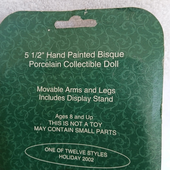 Collectible Celebration the Season Porcelain Doll in Peach Dress - Picture 2 of 6